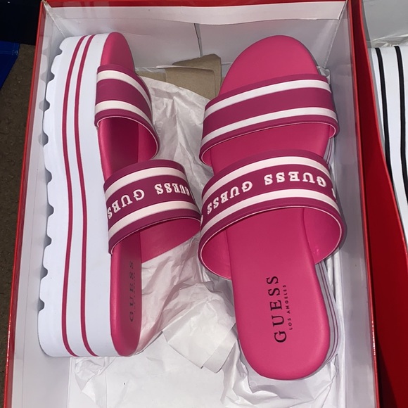 Selling Two Pairs of size 7 Guess Platforms. - Picture 2 of 2